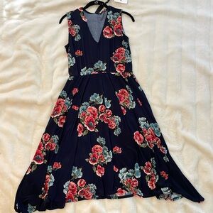 Woman’s navy floral midi dress.